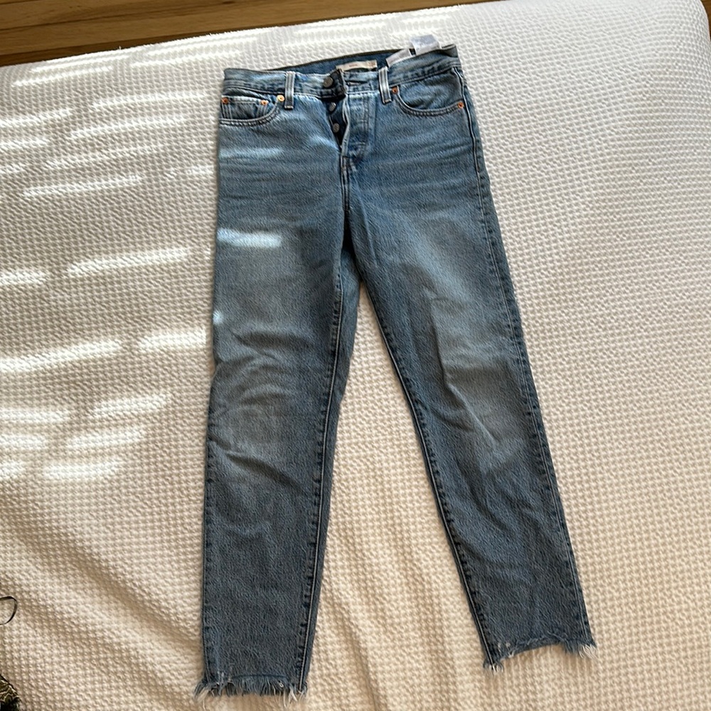 Levi’s raw hem jeans, size 26, wedgie cut